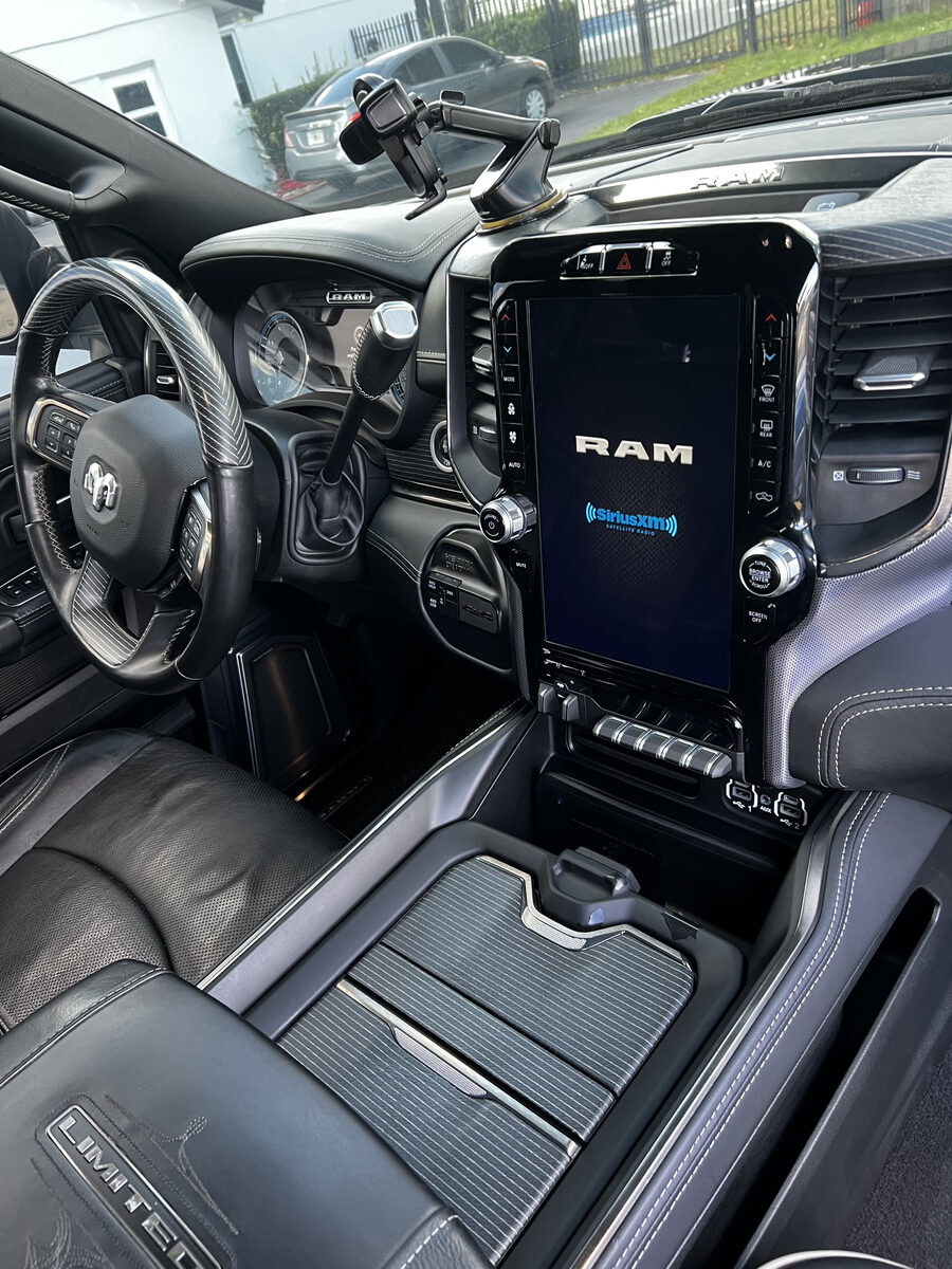 Clean RAM Limited truck interior with detailed dashboard and seats